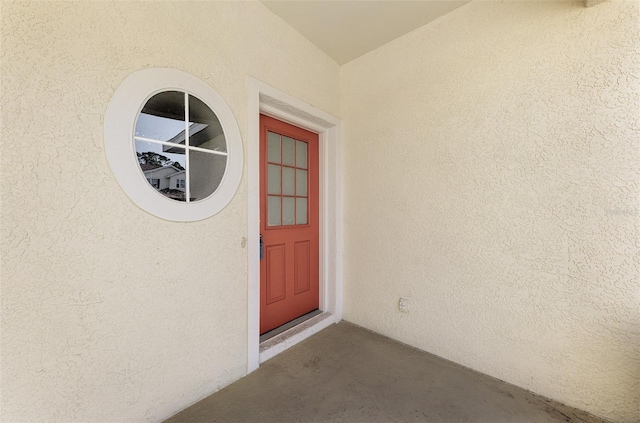 1156 Jonah Dr, North Port, FL 34289 - doorway to property with stucco siding