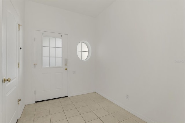 1156 Jonah Dr, North Port, FL 34289 - foyer featuring baseboards and light tile patterned floors