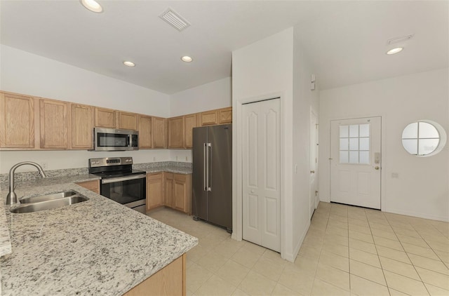 1156 Jonah Dr, North Port, FL 34289 - kitchen with visible vents, recessed lighting, appliances with stainless steel finishes, a sink, and light stone counters