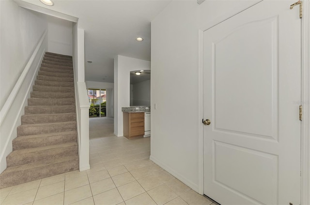 1156 Jonah Dr, North Port, FL 34289 - stairs featuring tile patterned floors and recessed lighting