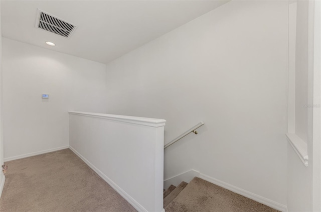 1156 Jonah Dr, North Port, FL 34289 - interior space featuring baseboards, visible vents, an upstairs landing, and carpet floors