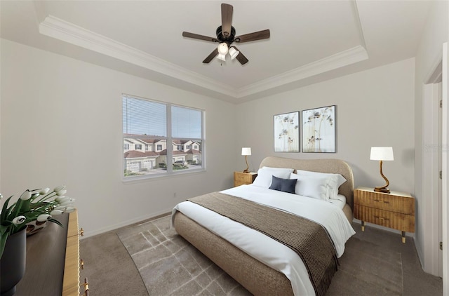 1156 Jonah Dr, North Port, FL 34289 - bedroom featuring a tray ceiling, baseboards, crown molding, and ceiling fan