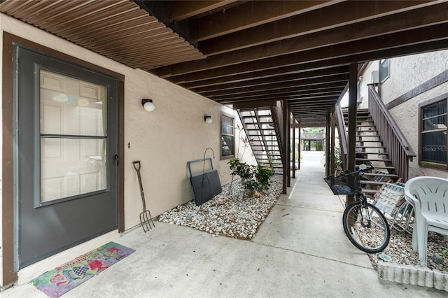 4022 Beaver Ln Unit 500C, Port Charlotte, FL 33952 - view of patio featuring stairway
