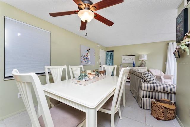 4022 Beaver Ln Unit 500C, Port Charlotte, FL 33952 - dining space featuring light tile patterned flooring, a ceiling fan, and baseboards