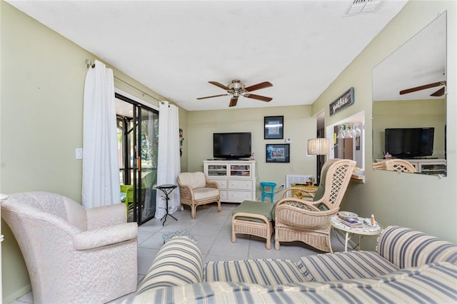 4022 Beaver Ln Unit 500C, Port Charlotte, FL 33952 - living room with ceiling fan and tile patterned floors