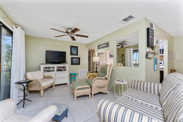 4022 Beaver Ln Unit 500C, Port Charlotte, FL 33952 - tiled living area with a ceiling fan