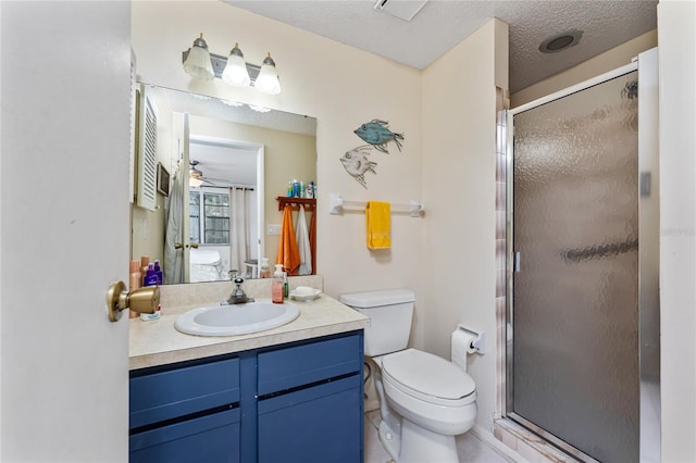 4022 Beaver Ln Unit 500C, Port Charlotte, FL 33952 - bathroom with vanity, toilet, a stall shower, a ceiling fan, and a textured ceiling