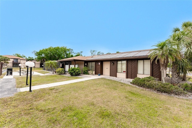 4022 Beaver Ln Unit 500C, Port Charlotte, FL 33952 - view of front of home featuring a front lawn