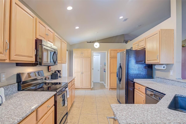 2699 Suncoast Lakes Blvd, Punta Gorda, FL 33980 - kitchen with light countertops, light brown cabinetry, and black appliances
