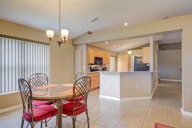 2699 Suncoast Lakes Blvd, Punta Gorda, FL 33980 - dining room featuring light tile patterned flooring, visible vents, baseboards, lofted ceiling, and a notable chandelier