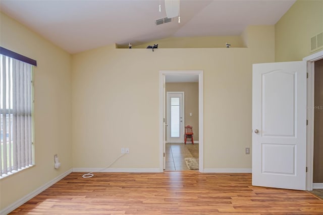 2699 Suncoast Lakes Blvd, Punta Gorda, FL 33980 - spare room featuring light wood finished floors, a wealth of natural light, visible vents, and a ceiling fan