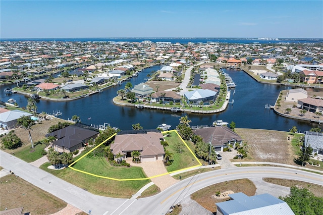 aerial view featuring a water view and a residential view