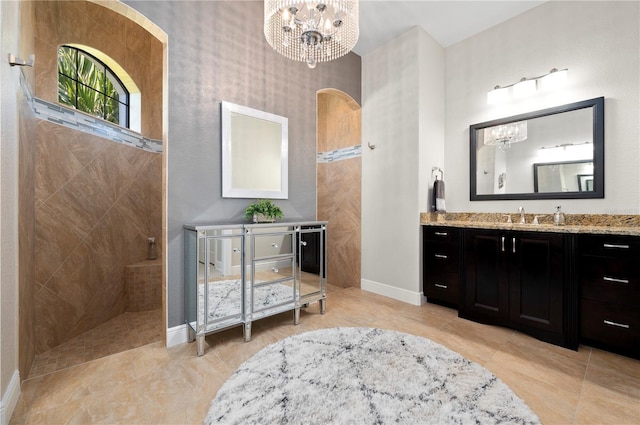 347 Portofino Dr, Punta Gorda, FL 33950 - full bath featuring a chandelier, vanity, walk in shower, and tile patterned floors