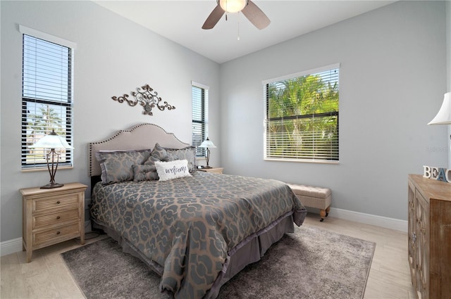 347 Portofino Dr, Punta Gorda, FL 33950 - bedroom with light wood-style floors and ceiling fan