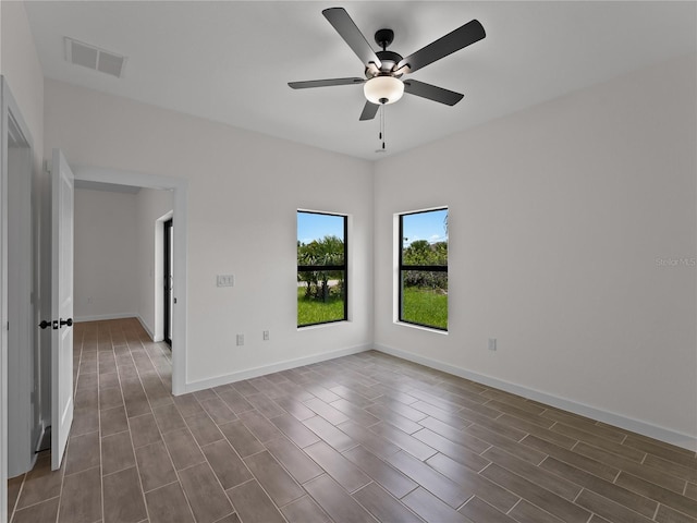 14449 Appleton Blvd, Port Charlotte, FL 33981 - spare room with ceiling fan and dark wood-type flooring