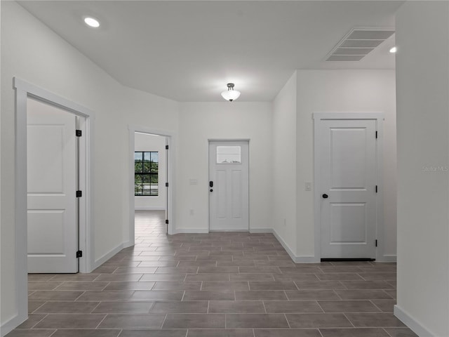 14449 Appleton Blvd, Port Charlotte, FL 33981 - entrance foyer with wood tiled floors and recessed lighting