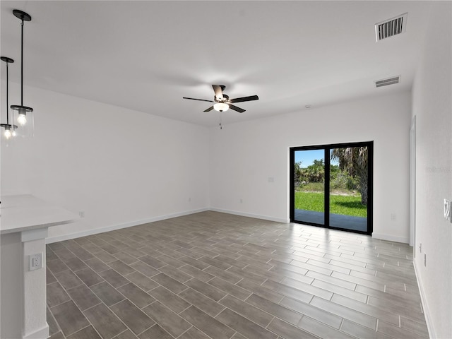 14449 Appleton Blvd, Port Charlotte, FL 33981 - spare room featuring a ceiling fan and wood finished floors