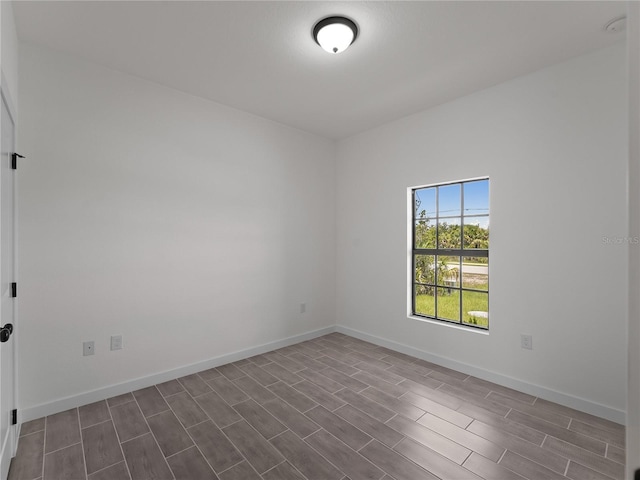 14449 Appleton Blvd, Port Charlotte, FL 33981 - empty room with wood finish floors and baseboards