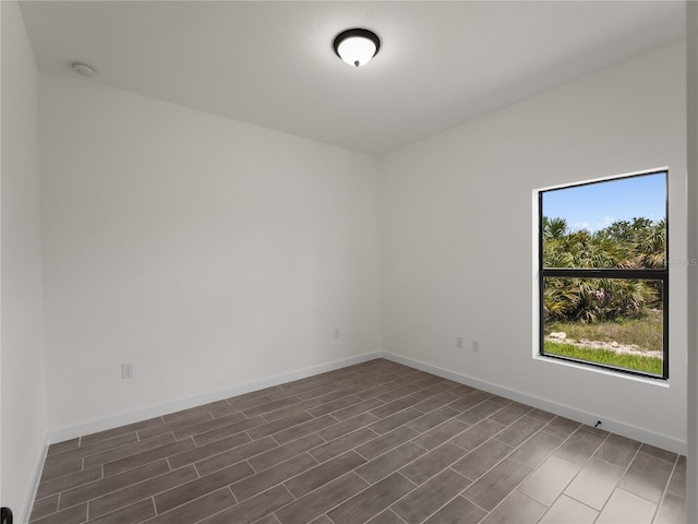 14449 Appleton Blvd, Port Charlotte, FL 33981 - unfurnished room featuring a smoke detector and wood finished floors