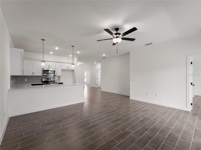 14449 Appleton Blvd, Port Charlotte, FL 33981 - unfurnished living room featuring recessed lighting, a ceiling fan, and dark wood finished floors
