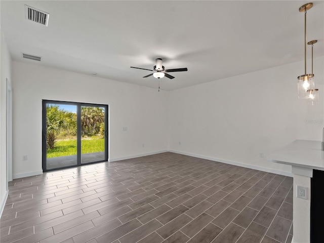 14449 Appleton Blvd, Port Charlotte, FL 33981 - unfurnished room featuring ceiling fan and dark wood finished floors