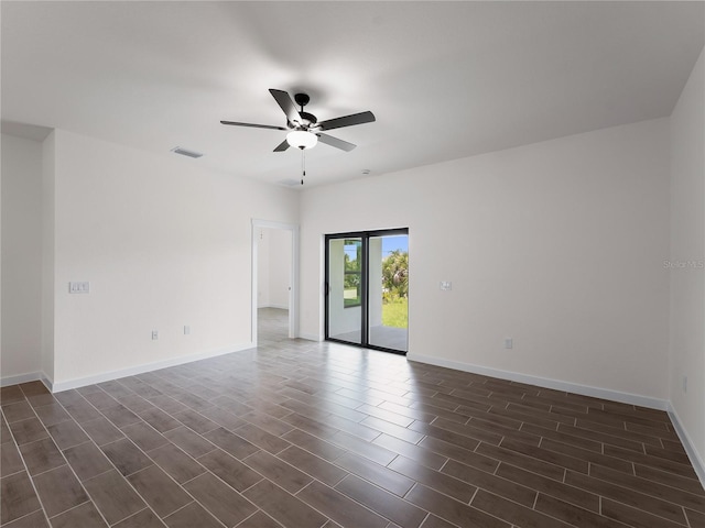 14449 Appleton Blvd, Port Charlotte, FL 33981 - unfurnished room featuring a ceiling fan and dark wood-style floors