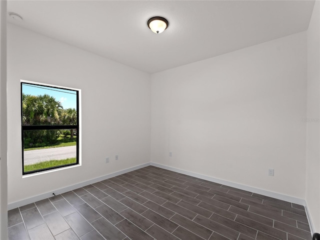 14449 Appleton Blvd, Port Charlotte, FL 33981 - empty room with baseboards and a smoke detector
