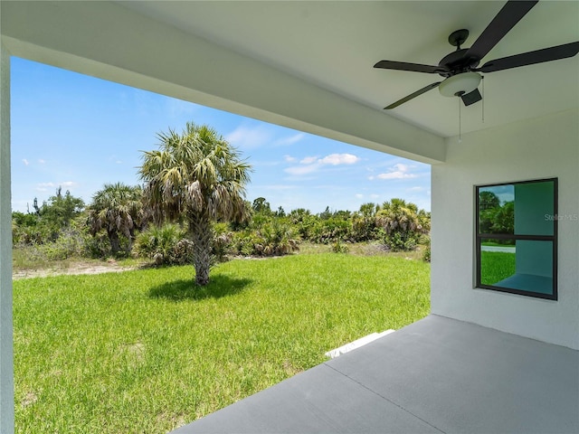 14449 Appleton Blvd, Port Charlotte, FL 33981 - view of green lawn featuring ceiling fan and a patio
