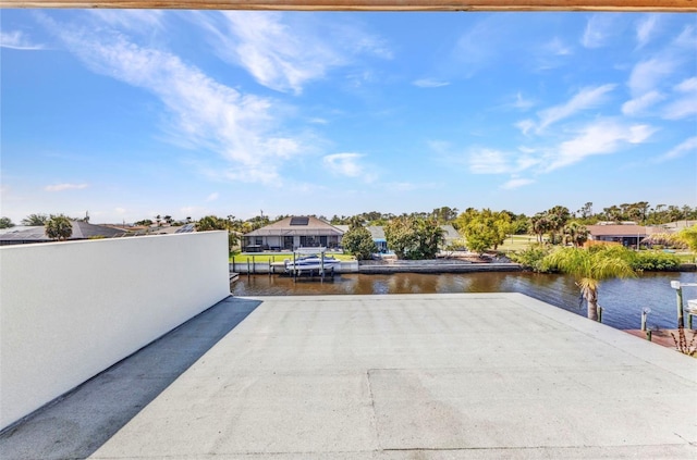view of patio / terrace with a water view