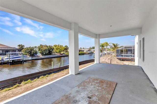view of patio featuring a water view