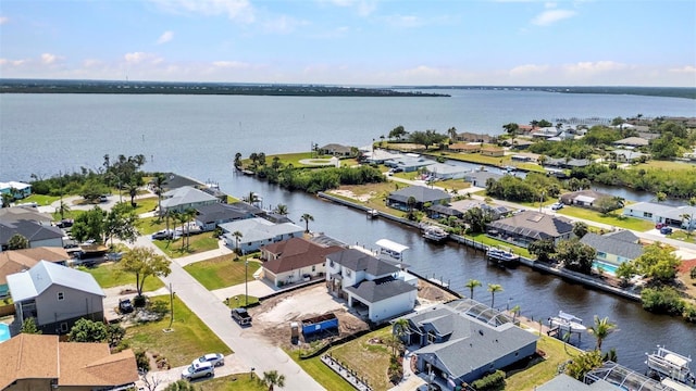 birds eye view of property with a residential view