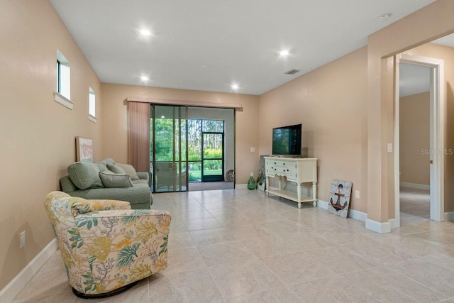 1352 Raspberry Dr, North Port, FL 34289 - living area featuring plenty of natural light and recessed lighting