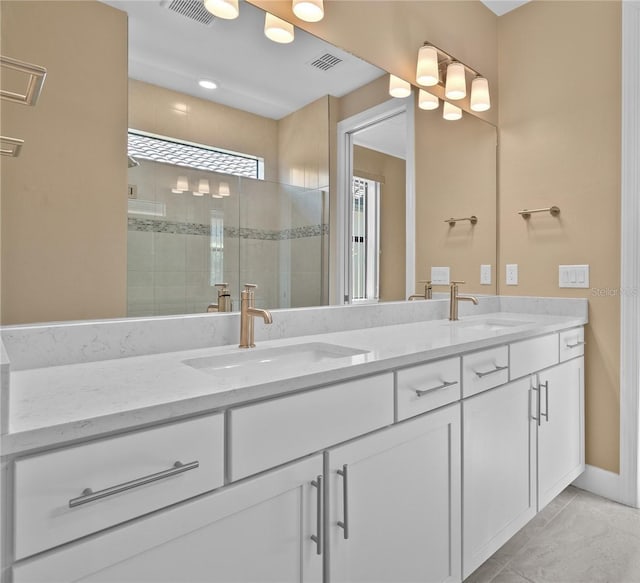 1352 Raspberry Dr, North Port, FL 34289 - full bathroom with double vanity and a stall shower