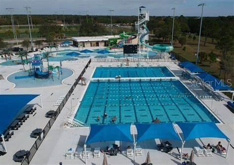 1352 Raspberry Dr, North Port, FL 34289 - community pool with a water slide