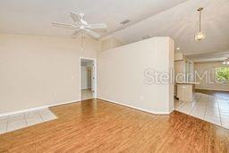 23482 Moreland Ave, Port Charlotte, FL 33954 - spare room with ceiling fan and wood finished floors