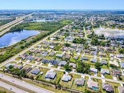 23482 Moreland Ave, Port Charlotte, FL 33954 - birds eye view of property with a water view