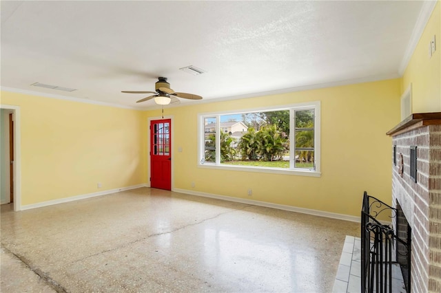 217 Palm Ave E, Nokomis, FL 34275 - unfurnished living room with a brick fireplace, ceiling fan, crown molding, baseboards, and speckled floor