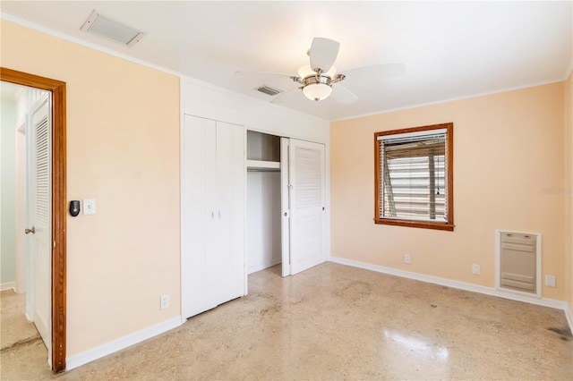 217 Palm Ave E, Nokomis, FL 34275 - unfurnished bedroom with crown molding, baseboards, dark speckled floor, and ceiling fan