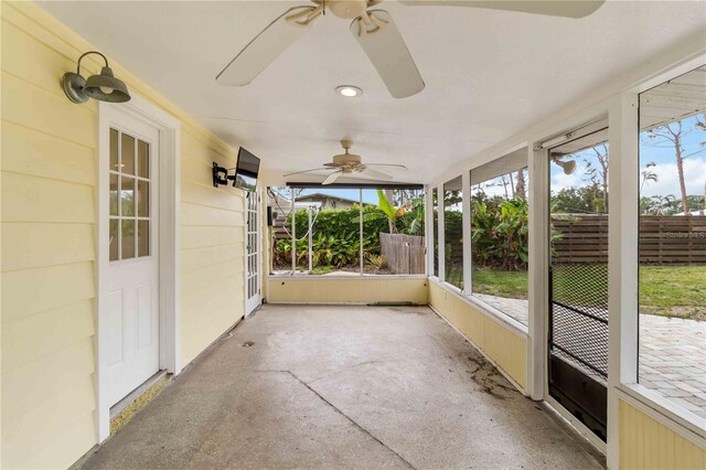 217 Palm Ave E, Nokomis, FL 34275 - unfurnished sunroom featuring ceiling fan