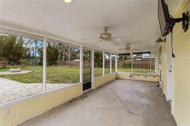 217 Palm Ave E, Nokomis, FL 34275 - unfurnished sunroom with ceiling fan and a fire pit