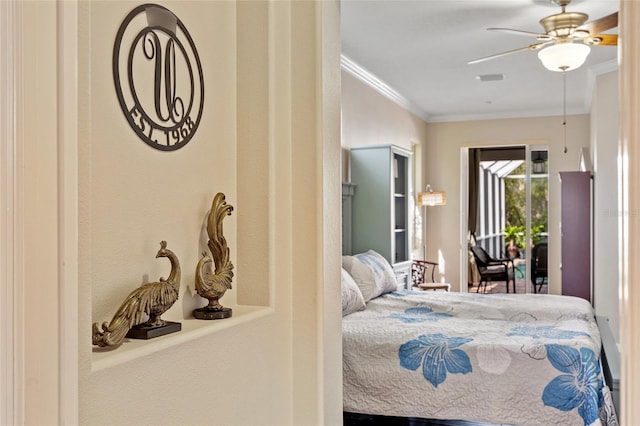 bedroom with access to exterior, ornamental molding, and a ceiling fan