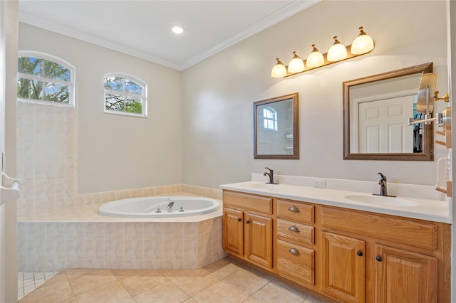bathroom with a sink, ornamental molding, double vanity, tile patterned flooring, and a garden tub