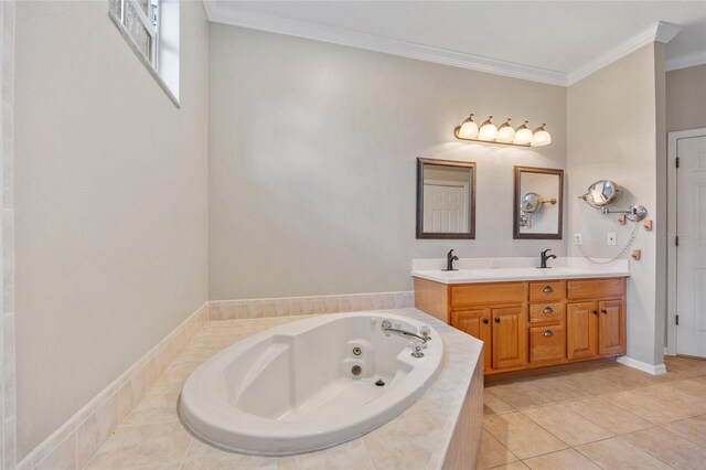 full bath featuring a sink, crown molding, a whirlpool tub, double vanity, and tile patterned floors