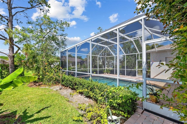 outdoor pool featuring a lanai