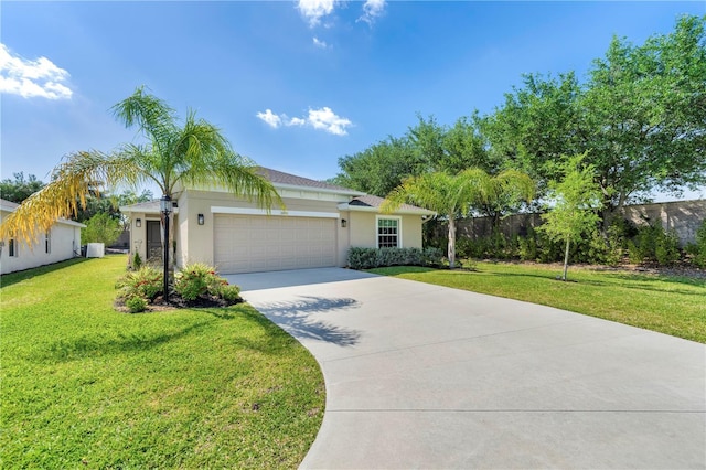 ranch-style house with a front yard, stucco siding, a garage, and concrete driveway