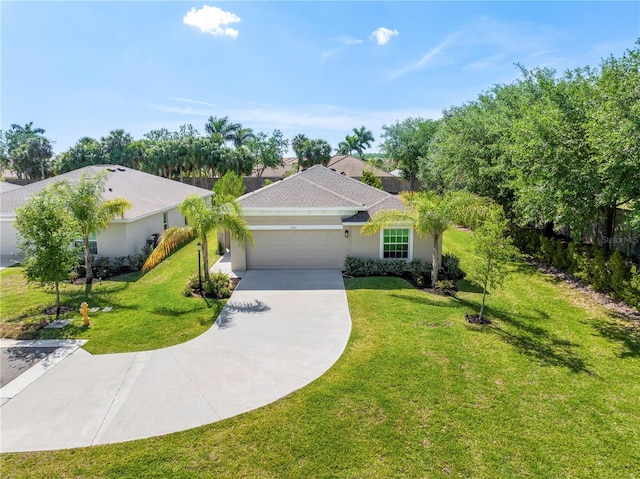 view of front of house with stucco siding, an attached garage, a front yard, and driveway