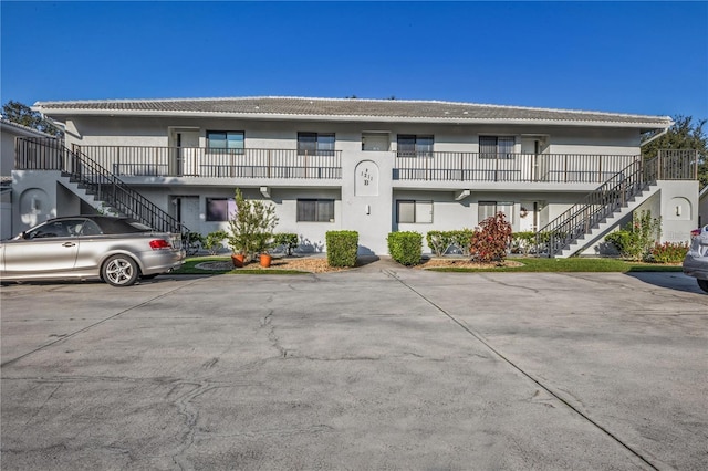 1211 Saxony Cir Unit B5, Punta Gorda, FL 33983 - view of property featuring stairway