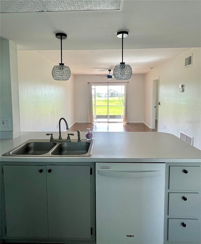 3310 Loveland Blvd Unit 1102, Punta Gorda, FL 33980 - kitchen with white dishwasher, decorative light fixtures, light countertops, open floor plan, and ceiling fan