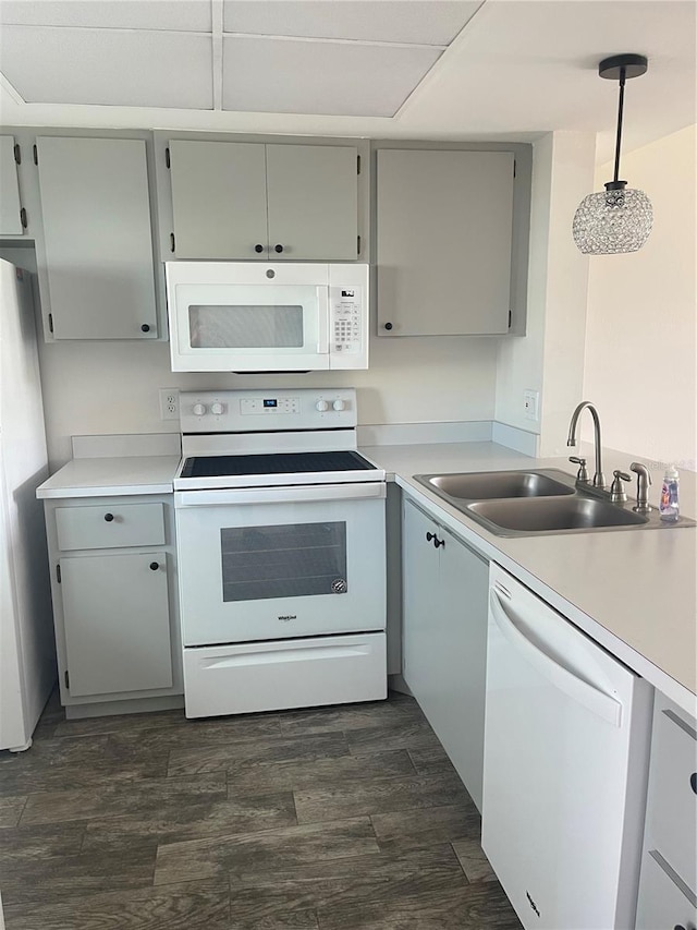 3310 Loveland Blvd Unit 1102, Punta Gorda, FL 33980 - kitchen with white appliances, gray cabinets, and light countertops