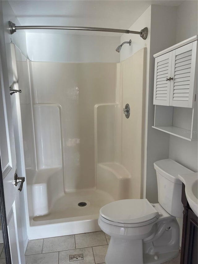 3310 Loveland Blvd Unit 1102, Punta Gorda, FL 33980 - bathroom with tile patterned floors, walk in shower, and vanity